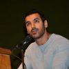 John Abraham interacts with the audience at the Launch of the Book In Search Of Dignity And Justice