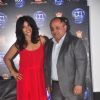 Ekta Kapoor poses with a guest at the Press Meet of Dolby Atmos