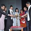 Neha Dhupia was snapped lighting the lamp at Whistling Woods