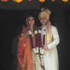 Soha Ali Khan and Kunal Khemu pose for the media at their Wedding Day