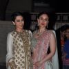 Karisma Kapoor and Kareena Kapoor pose at Soha Ali Khan and Kunal Khemu's Wedding Reception