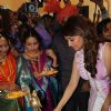 Madhuri Dixit Nene lights the lamp at the Inaugration of P.N. Gadgil Jewellers' New Showroom