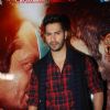 Varun Dhawan poses for the media at the Promotions of Badlapur on CID