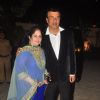 Anu Malik poses with wife at Hinduja Bash