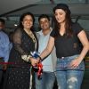 Parineeti Chopra and Madhu Chopra cut the ribbon at the Promotions of Te Mugshot Cafe