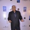 Satish Shah poses for the media at the Launch of Farhad Samar's Book 'Flash Point'