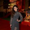 Mouni Roy poses for the media at the Annual Day of Children's Welfare Centre High School