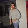 Rohit Dhawan poses for the media at the Special Screening of Badlapur