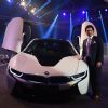 Sachin Tendulkar poses alongside the new BMW i8 at the Launch