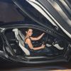 Kangana Ranaut gets behind the wheels of the new BMW i8 at the Launch