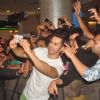Varun Dhawan clicks a selfie with fans at the Promotions of Badlapur at R City Mall