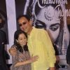 Vidhu Vinod Chopra was snapped hugging wife Anupama Chopra at the Book Launch