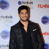 Sidharth Malhotra poses for the media at Filmfare Glamour and Style Awards