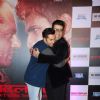 Karan Johar hugs Varun Dhawan at the Success Bash of Badlapur