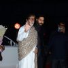 Amitabh Bachchan and Abhishek Bachchan pose for the media at Tulsi Kumar's Wedding Reception