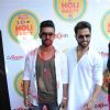 Ravi Dubey and Rithvik Dhanjani pose for the media at Zoom Holi Bash