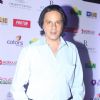 Rahul Roy poses for the media at Smile Foundation Charity Fashion Show