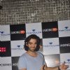 Karan V Grover poses for the media at Tom Tailor and Jabong Bash