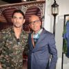 Sushant Singh Rajput and Narendra Kumar pose for the media at Amazon India Fashion Week 2015 Day 2