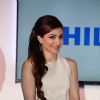 Soha Ali Khan poses for photographers at the Launch of the Latest 4K Ultra HD TV