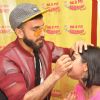 Ranveer makes a tattoo at Promotions of Dil Dhadakne Do at Radio Mirchi