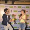 Jackky Bhagnani giving Lauren Gottlieb a bouquet of flowers at the Promotions of Welcome To Karachi