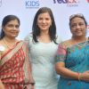 Urvashi Sharma poses with guests at 'Safe Kids Day' Event