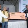 Varun Badola receives an award at Gold Charity Match