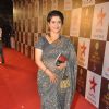 Supriya Pilgaonkar poses for the media at Star Parivaar Awards 2015