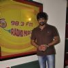 R. Madhavan poses for he media at Radio Mirchi Studio