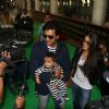Riteish Deshmukh poses with Genelia and their Son Riaan at KL Airport