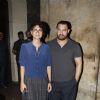 Aamir Khan and Kiran Rao pose for the media at the Special Screening of Dil Dhadakne Do