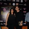 Omung Kumar poses with Wife at the Premier of Dil Dhadakne Do at IIFA 2015