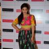 Shruti Haasan poses for the media at Haute Curry Collection