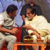 Amitabh Bachchan with Hon'ble Minister Vinod Tawdde at a Book Reading Event