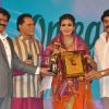 Raveena Tandon and Chiranjeevi at TSR Tv9 National Awards