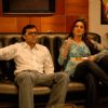 Juhi Babbar : Radhika and Rajdeep sitting on a sofa