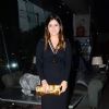 Simone Khan poses for the media at Zarine Khan's Book Launch
