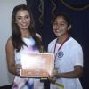 Amy Jackson gives away award to the student at the Promotions of Singh is Bling at Jaihind College