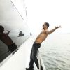 Akshay Kumar standing on a boat