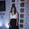 Simone Khan poses for the media at Elle Beauty Awards