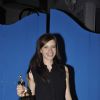Kalki Koechlin poses with her Trophy delivered to her by Sonam Kapoor at Olive