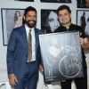 Farhan Akhtar Holds His Picture Frame at Dabboo Ratnani's Calendar Launch