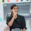 Sonam Kapoor waves to the students at Xaviers College