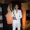 Sonam Kapoor poses with her Award at NDTV L'oreal Paris 'Women of Worth Awards'