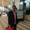 Madhur Bhandarkar poses for the media at Airport