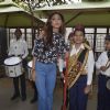 Shilpa Shetty posing with student at Jamnabai School