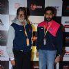 Amitabh Bachchan and Abhishek Bachchan pose for the media at Pro Kabaddi Match