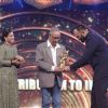 Rohit Shetty presents Lifetime Achievment Award to Veeru Devgn