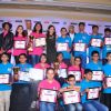 Soha Ali Khan poses with Children at Spell Bee Event